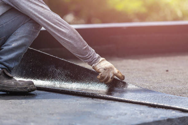 Professional Exterior Waterproofing technician working in Hickory Corners, MI